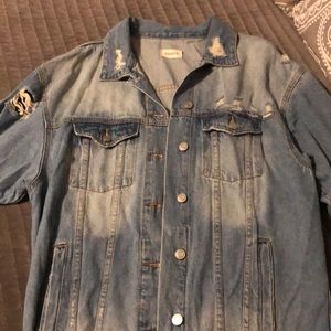 Distressed denim jacket